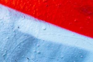 Fragment of colored graffiti painted on a wall. Bright abstract background. photo