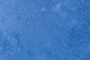 Texture of blue decorative plaster or stucco or concrete. Abstract background for design. photo