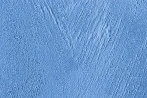 Texture of blue decorative plaster or stucco or concrete. Abstract background for design. photo