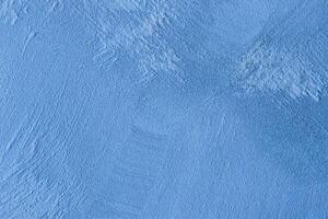 Texture of blue decorative plaster or stucco or concrete. Abstract background for design. photo