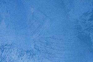 Texture of blue decorative plaster or stucco or concrete. Abstract background for design. photo