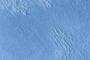Texture of blue decorative plaster or stucco or concrete. Abstract background for design. photo