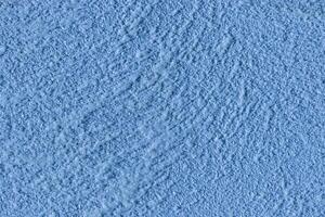 Texture of blue decorative plaster or stucco or concrete. Abstract background for design. photo
