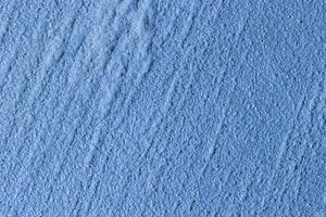 Texture of blue decorative plaster or stucco or concrete. Abstract background for design. photo