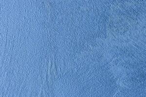 Texture of blue decorative plaster or stucco or concrete. Abstract background for design. photo