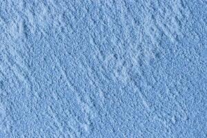 Texture of blue decorative plaster or stucco or concrete. Abstract background for design. photo