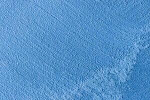 Texture of blue decorative plaster or stucco or concrete. Abstract background for design. photo