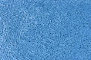 Texture of blue decorative plaster or stucco or concrete. Abstract background for design. photo