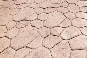 Yellow stone pavement abstract background. photo