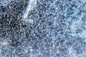 Texture of ice in the winter. Abstract background for design. photo