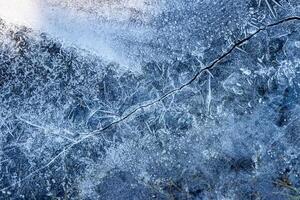 Texture of ice in the winter. Abstract background for design. photo
