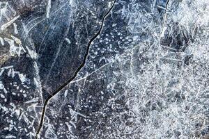 Texture of ice in the winter. Abstract background for design. photo