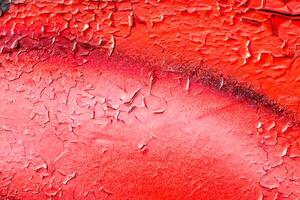 Fragment of colored graffiti painted on a stone wall. Old peeling paint. photo