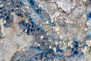 Graffiti painted on a concrete wall texture. photo