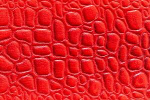 Red leather texture. Abstract background. photo