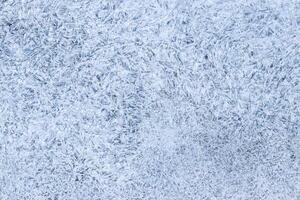 Texture of ice in the winter. Abstract background for design, photographed closeup. photo