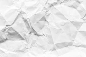 Crumpled white paper texture. Abstract background for design. photo
