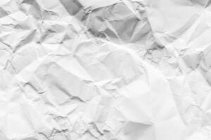 Crumpled white paper texture. Abstract background for design. photo