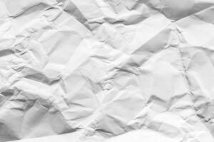 Crumpled white paper texture. Abstract background for design. photo
