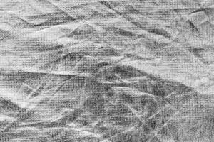 Texture of silver crumpled fabric cloth. Abstract background for design with copy space. photo