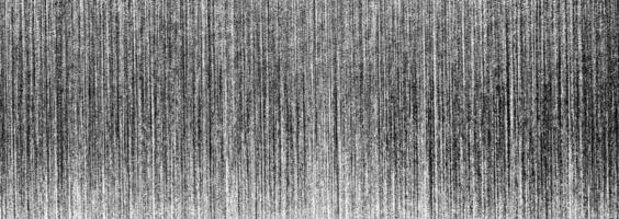Metal texture with white scratches. Abstract noise black background overlay for design. photo