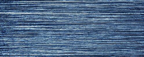 Metal texture with white scratches. Abstract noise black background overlay for design. photo