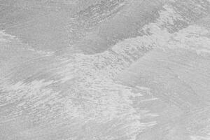 Texture of gray decorative plaster or concrete. Abstract black and white backdrop for design. photo