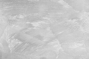 Texture of gray decorative plaster or concrete. Abstract black and white backdrop for design. photo