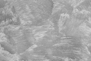 Texture of gray decorative plaster or concrete. Abstract black and white backdrop for design. photo