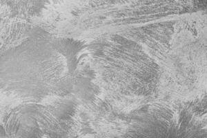 Texture of gray decorative plaster or concrete. Abstract black and white backdrop for design. photo