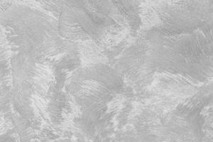 Texture of gray decorative plaster or concrete. Abstract black and white backdrop for design. photo