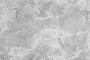 Texture of gray decorative plaster or concrete. Abstract black and white backdrop for design. photo