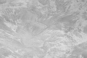 Texture of gray decorative plaster or concrete. Abstract black and white backdrop for design. photo