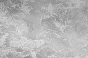 Texture of gray decorative plaster or concrete. Abstract black and white backdrop for design. photo