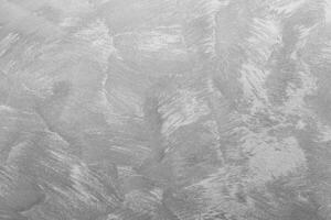 Texture of gray decorative plaster or concrete. Abstract black and white backdrop for design. photo