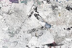 Fragment of colored graffiti painted on a wall. Bright abstract background. photo