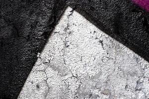 Fragment of colored graffiti painted on a wall. Bright abstract background. photo
