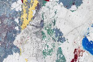 Fragment of colored graffiti painted on a wall. Bright abstract background. photo