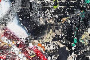 Fragment of colored graffiti painted on a wall. Bright abstract background. photo
