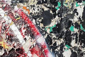 Fragment of colored graffiti painted on a wall. Bright abstract background. photo