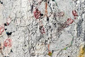Fragment of colored graffiti painted on a wall. Bright abstract background. photo