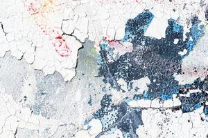 Fragment of colored graffiti painted on a wall. Bright abstract background. photo