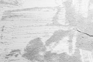 Texture with traces of torn paper. Abstract black and white background for design with copy space. photo