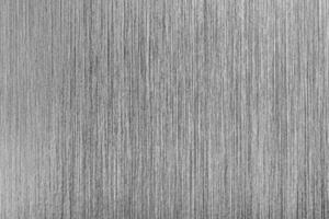 Silver metal texture with white scratches. Abstract noise black background overlay for design. photo