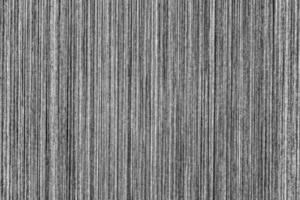 Silver metal texture with white scratches. Abstract noise black background overlay for design. photo