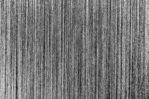 Silver metal texture with white scratches. Abstract noise black background overlay for design. photo