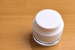 The beautiful photo captures the elegance of good cosmetic packaging for cream containers, highlighting future cosmetic innovations with sleek, modern designs.