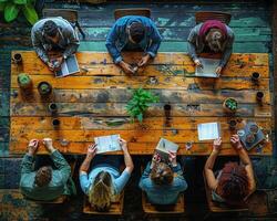 A diverse group of colleagues working on a group project. photo