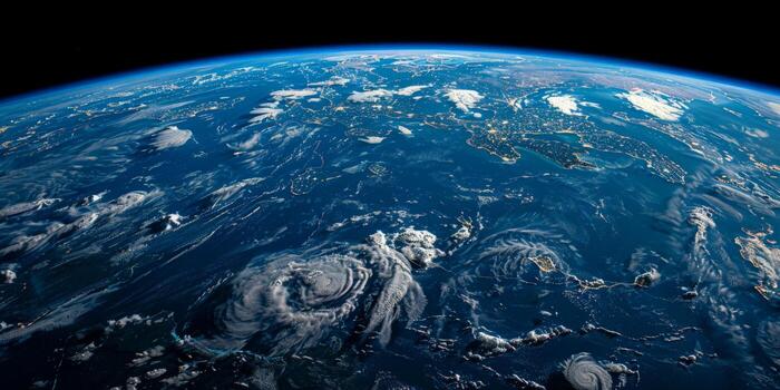 A breathtaking aerial view of the illuminated earth from space during nighttime photo