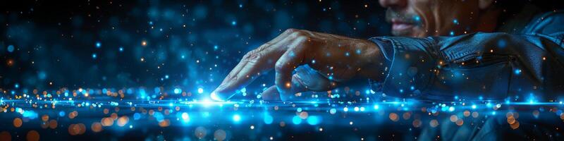A man is interacting with a hightech display screen using his finger photo